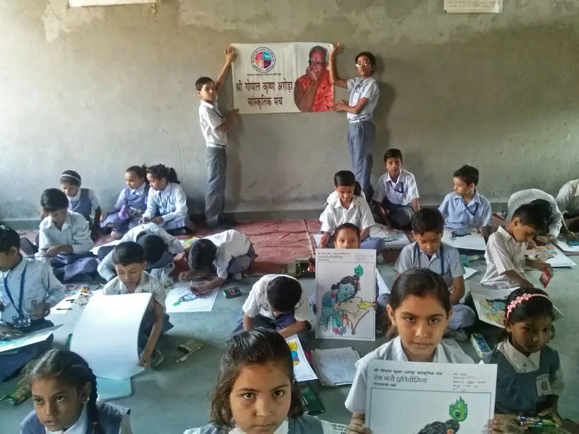 School children taking part in a colouring competition run by the Nyaas